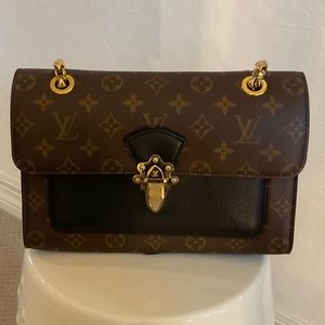 Louis Vuitton Victoire Handbag Monogram Canvas and Leather